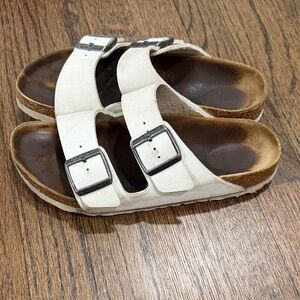 Birkenstock White Sandals with Black Buckles